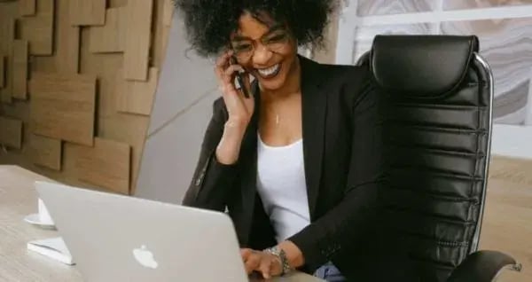 woman-in-black-blazer-sitting-on-black-office-chair-3727464-scaled-e1585573452984
